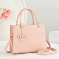 Pink lychee texture tote bag with golden heart pendant and adjustable shoulder strap - Pink