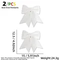 Set of two white Christmas bows with silver glitter finish and hanging loops for decor - 2 Pcs/Set / White