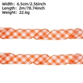 Detalle de cinta a cuadros naranja de 6,5cm con especificaciones de ancho y largo - Longitud Corta Dos / Cuadrícula Naranja y Blanca