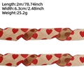 Detail view showing 6.3cm wide linen ribbon with red heart print and dimensions - 2m / Linen Base Red Heart