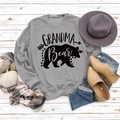 Flat lay of gray Grandma Bear sweatshirt with autumn hat, scarf and pumpkins - S / Grey (Black Text)