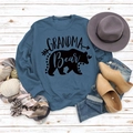 Flat lay of blue-grey long sleeve sweatshirt featuring black Grandma Bear graphic print - S / Blue (Black Text)