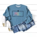 Detailed flat lay of a blue speech therapy sweatshirt with jeans and white sneakers - Blue (Black Print)