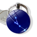 Portachiavi con costellazione del Toro blu, cupola in vetro e ciondolo in metallo - Toro