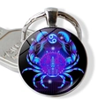 Neonblauer Krebs-Sternzeichen Schlüsselanhänger aus Glas mit silberner Metallbasis - Krebs Stil (JY002316-4Cancer)