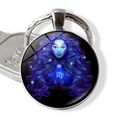 Détail d'un porte-clés zodiaque argenté avec illustration bleue du signe de la Vierge - Style Vierge (JY002316-6Virgo)