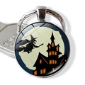 Detail of Halloween keychain with glass cabochon showing a witch and moon design - Witch Flying Under Moon (JY002534-3)