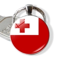 Detail of Tonga flag keychain with silver metal frame and glossy round glass pendant - Tonga
