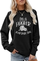 Dettaglio della felpa I'm a Hooker con tessuto in cotone di qualità e stampa grafica bianca - S / Nero