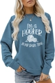 Detail shot of navy blue sweatshirt featuring I'M a Hooker crochet hobby design - S / Blue (White Font)