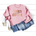 Flat lay of pink Books and Coffee sweatshirt with denim shorts on white wood background - S / Pink