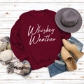 Close-up of burgundy Whiskey Weather print sweatshirt with autumn harvest styling - Wine Red Sweatshirt (White Font)