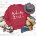 Flat lay of Whiskey Weather sweatshirt with autumn accessories on white wood floor - Red Sweatshirt (White Font)