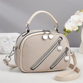 Elegante borsa beige a trama intrecciata con scomparti a cerniera e manico superiore - Bianco Sporco