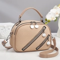 Elegant beige woven texture handbag with metallic pendant for daily commuting and office use - Khaki