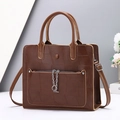 Brown faux leather tote bag with geometric patchwork and stylish silver chain detail - Coffee