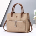 Elegant beige tote bag with geometric texture and silver chain detail for women - Khaki