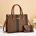 Detail of striped tote bag with leather straps, gold hardware and matching coin purse - Earthy Yellow