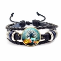 Close-up of Halloween leather bracelet with bronze pumpkin and black cat glass dome charm - Pumpkin & Moon Tree Style (JY002586-5)