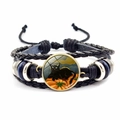 Retro Halloween braided leather bracelet featuring black cat pumpkin glass dome charm - Cat on Pumpkin Style (JY002586-12)