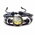 Halloween woven leather bracelet with luminous pumpkin glass charm and metal accents - Glow Pumpkin Style (JY002591-11)