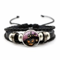 Detail of Halloween braided leather bracelet with pumpkin glass cabochon charm - Castle Pumpkin(JY002576-9)