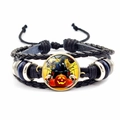 Close-up of Halloween pumpkin and skull illustration on braided leather bracelet - Skeleton Illustration Style (JY002585-4)