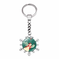 Close-up of snowflake keychain with a red-haired angel illustration on green background - Red-Haired Angel Style (JY002906-6)
