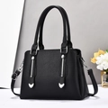 Black pebbled leather tote bag with silver hardware and detachable strap for women - Black
