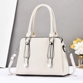 Elegant off-white lychee leather tote bag with dual handles and silver hardware accents - Off White