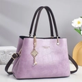 Elegant lavender tote bag with crocodile pattern and golden knot charm detail - Taro Purple