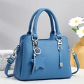 Sac à main bleu en cuir litchi avec boucle argentée et pendentif étoile décoratif - Bleu