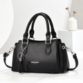 Classic black litchi pattern leather handbag with adjustable strap and star pendant - Black
