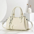 Fashionable beige lychee grain leather handbag with dual handles and crossbody strap - Off White