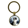Portachiavi con Border Collie in vetro bronzo con motivo di foresta invernale innevata - Bronzo