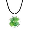 Detailed view of silver clover pendant with green leaf specimen and black leather cord - Realistic Green Leaf Style (JY003245-1)