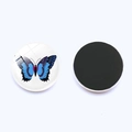 Detailed view of 25mm round glass butterfly fridge magnet with black magnetic backing - Blue Glass Dome Butterfly (JY003518-9)