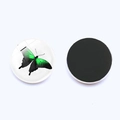 Detailed front and back view of a 25mm round glass butterfly magnetic fridge sticker - Green and Black Realistic Butterfly (JY003518-14)