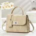 Borsa a mano beige in pelle testurizzata con chiusura argento e dettagli floreali - Cachi