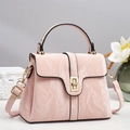 Elegant pink pleated crossbody bag with golden clasp and adjustable strap for women - Pink