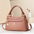 Elegante Handtasche für Damen in Mauve mit Lederstruktur und goldenem Taschenzubehör - Rosa