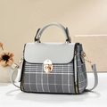 Classic houndstooth plaid Kelly bag with grey leather accents and gold buckle - Gray