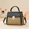 Women's crossbody bag with black flap and khaki monogram print featuring gold lock buckle - Black and Brown