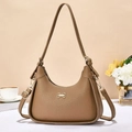 Vintage brown lychee pattern leather shoulder bag with fashion bow logo on warm background - Khaki