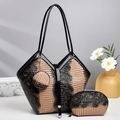 Detailed view of 3-piece set featuring textured animal print tote and matching bags - Khaki