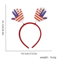 Detailed size chart for Independence Day headband with dimensions 21.1cm by 19.1cm - One Size / Hamsa Hand Style