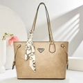 Detail of champagne leather tote bag with metal logo and chain print silk scarf - Light Khaki