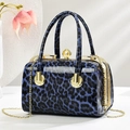 Blue leopard print patent leather handbag with pearl clasp and golden chain strap - Blue