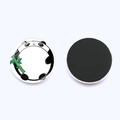 Close-up of circular glass panda fridge magnet with cute bamboo illustration and black magnetic back - Jy003540-6