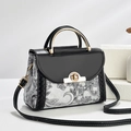 Retro stylish floral print handbag with metal handle and adjustable shoulder strap - Black